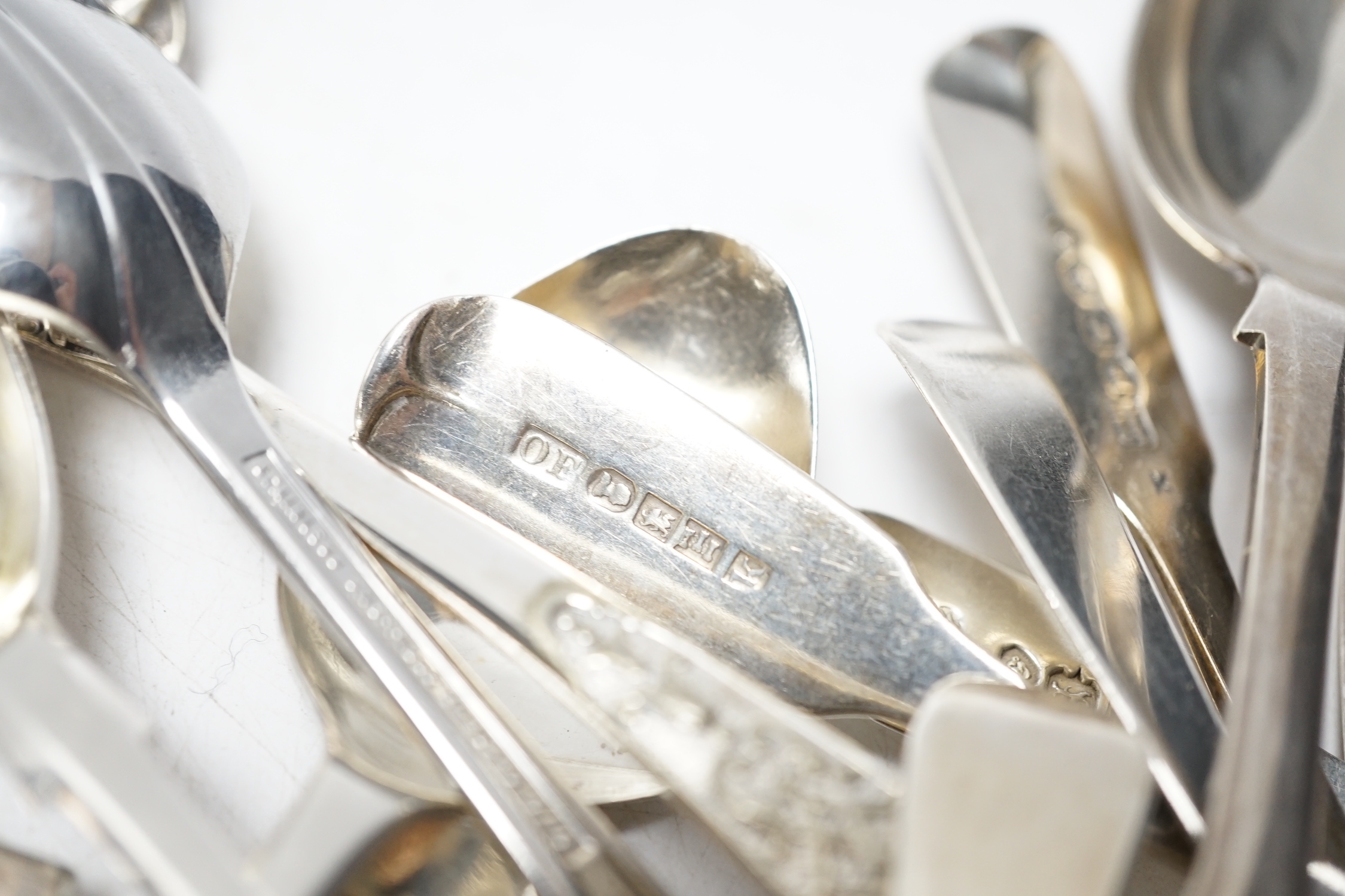 Sundry silver cutlery, including a pair of Victorian Kings pattern table forks and a matching tablespoon, London, 1845, a William IV fiddle pattern sauce ladle and various salt, tea and coffee spoons, 21.9oz and three pl
